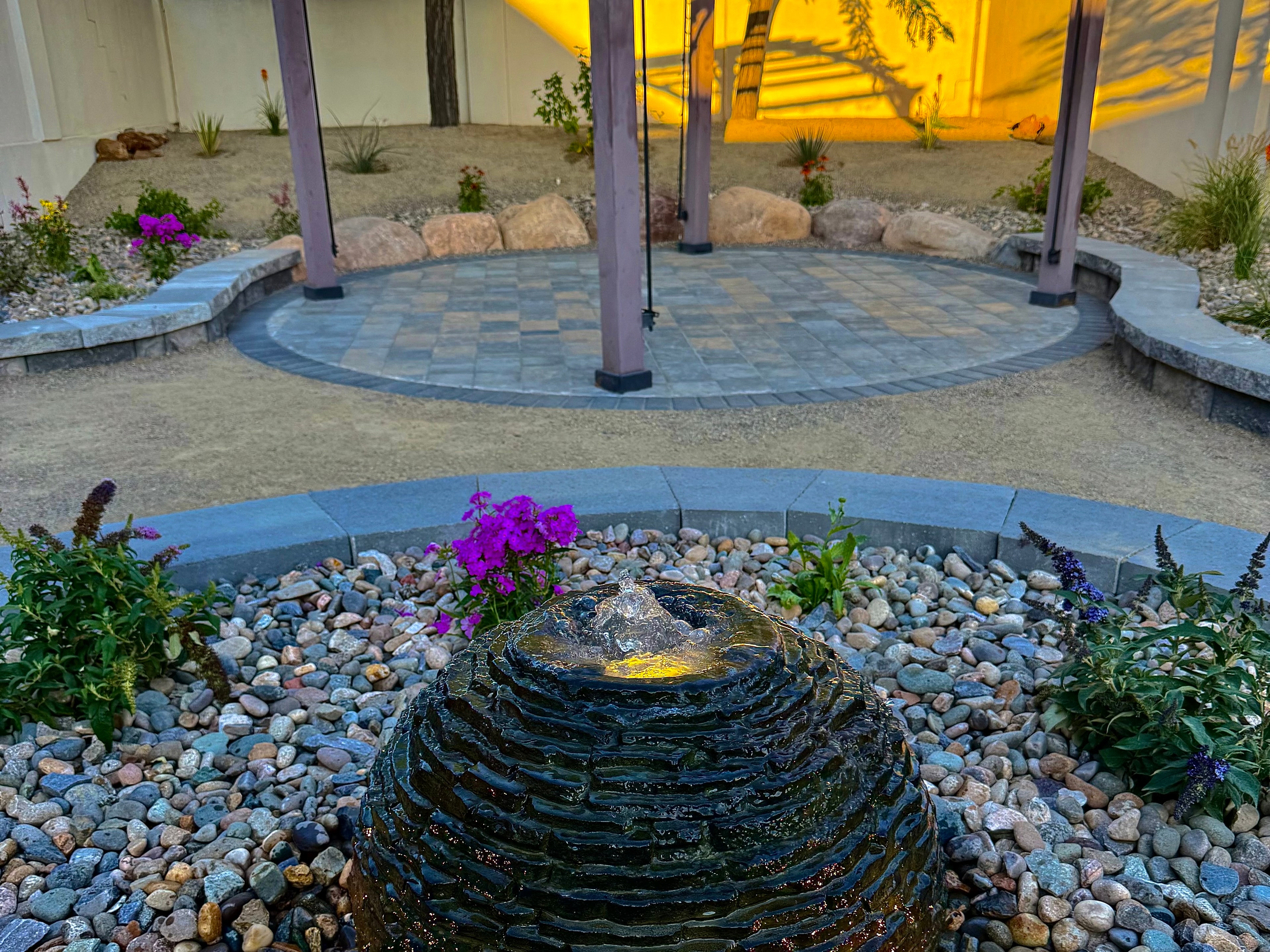 Decorative courtyard water fountain feature with paver surround in the Four Corners area — High Desert NativeScapes